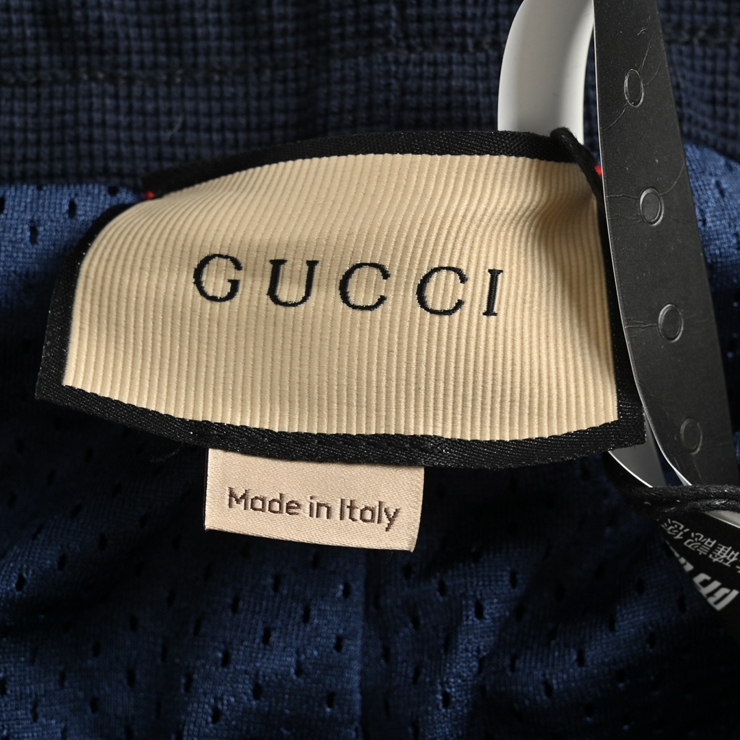 Gucci 24Fw embroidered logo paneled cuffed trousers