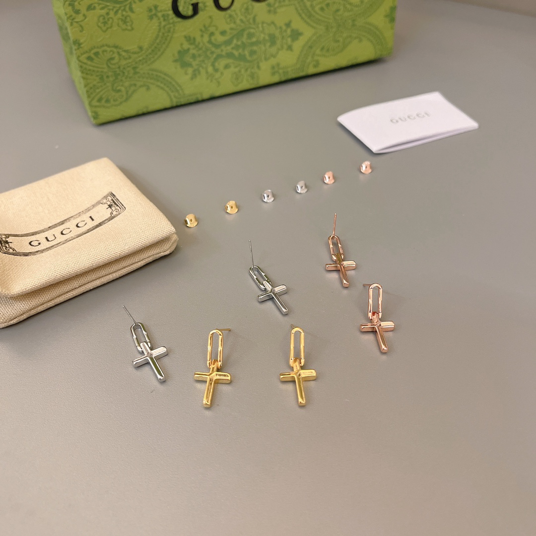 GUCCi cross earrings