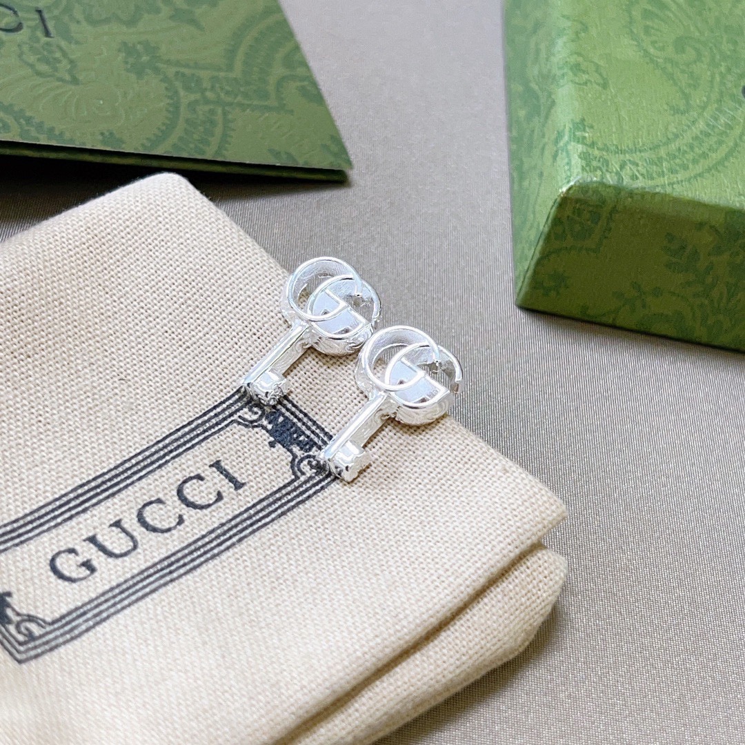 GUCCi key earrings