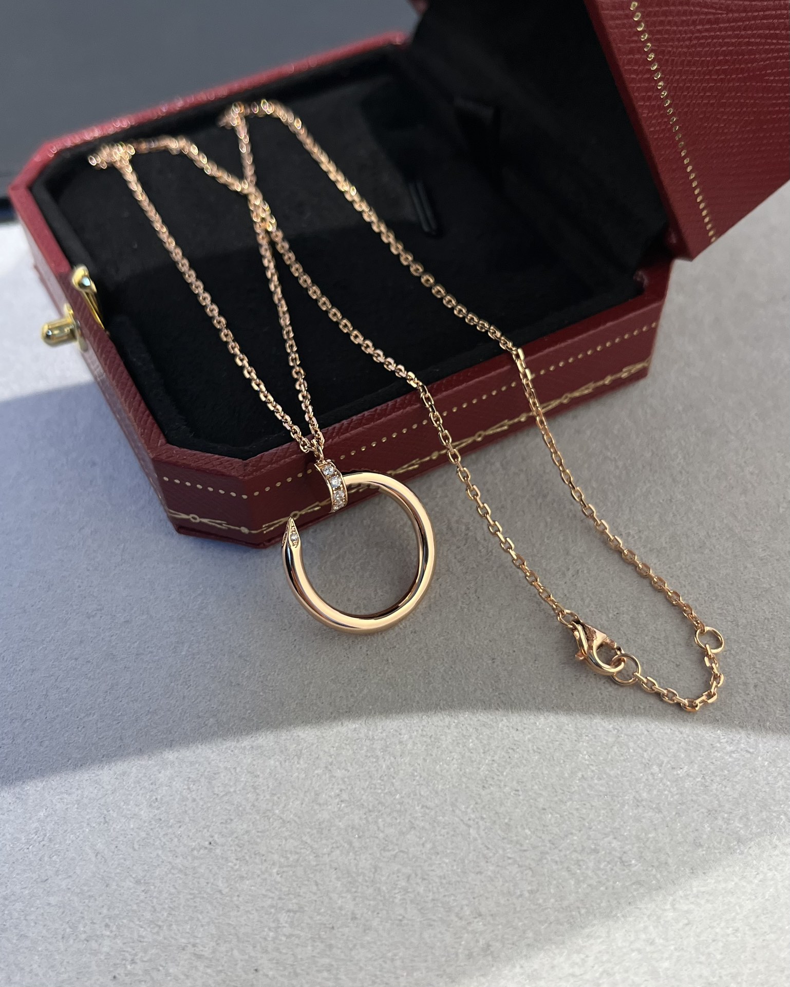 Cartier head and tail diamond nail necklace
