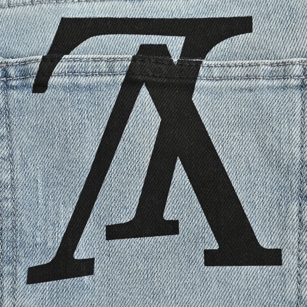 Louis Vuitton Inverted letter print jeans