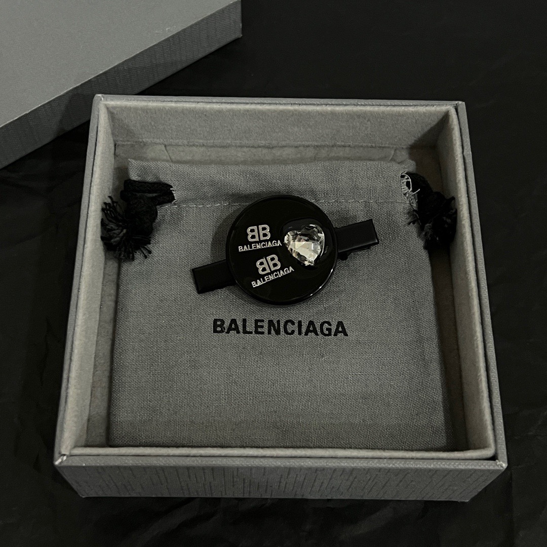 Balenciaga round diamond hairpin