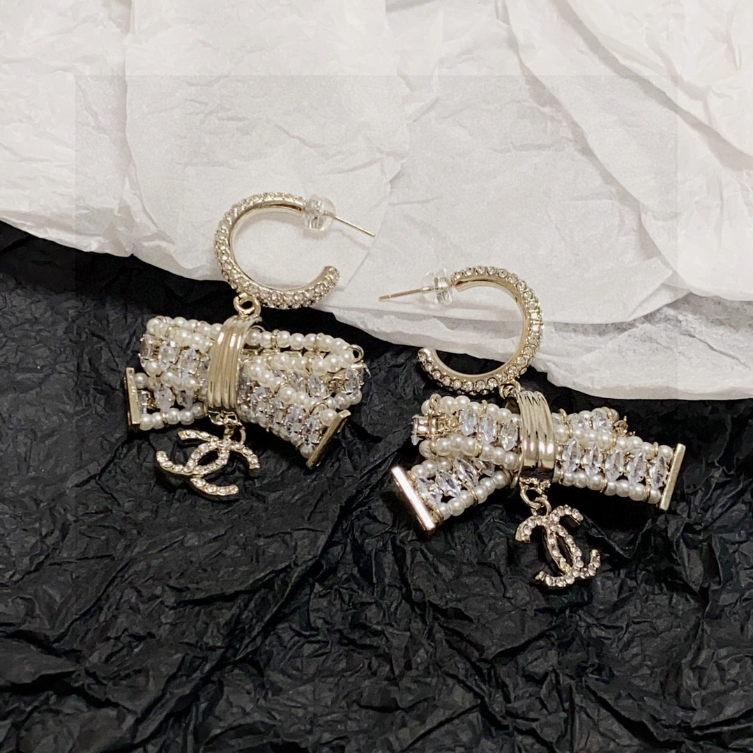 Chanel full diamond pearl bow earrings